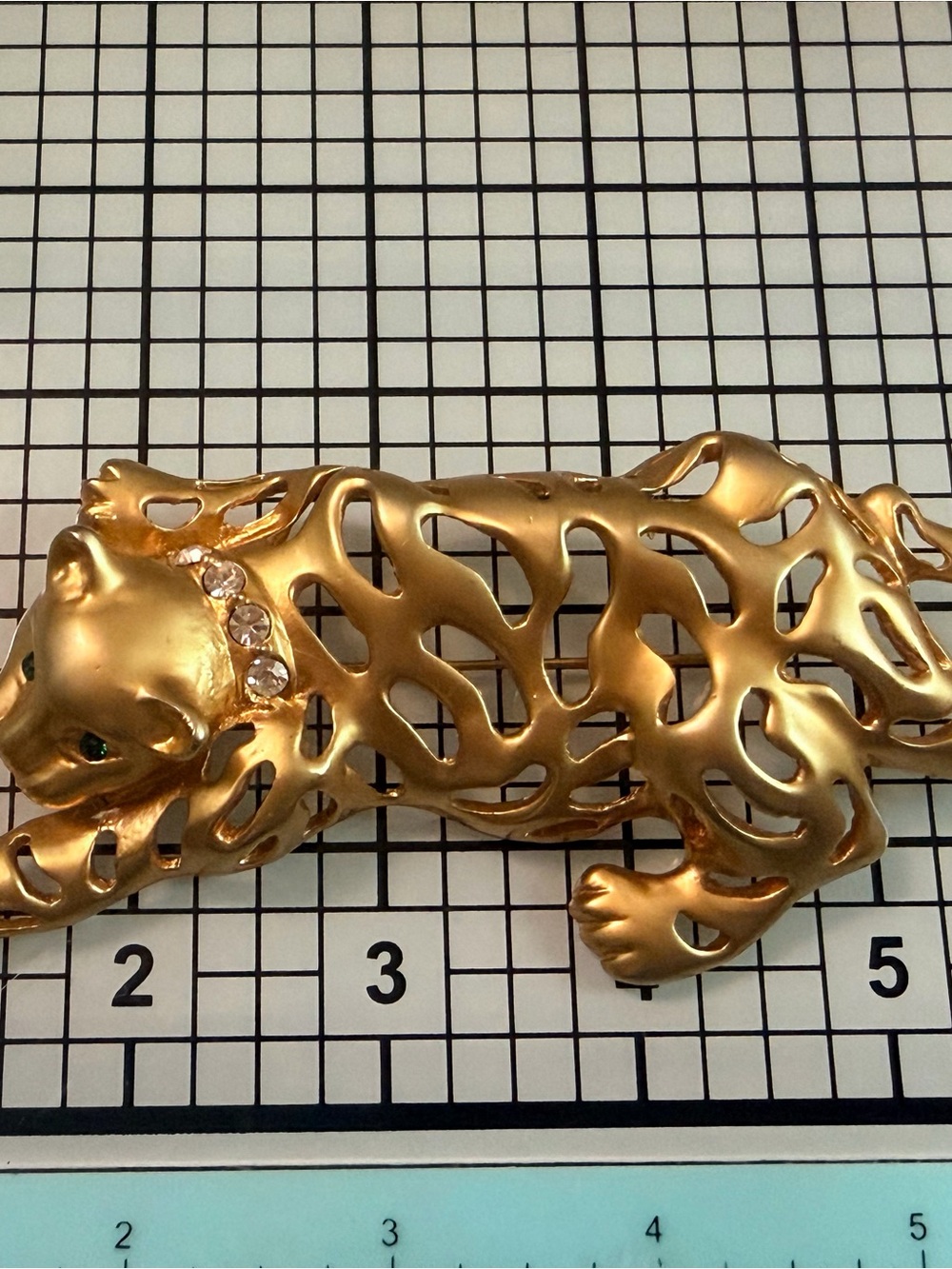 Gold Toned Filigree Panther Brooch with Rhinestone Collar
